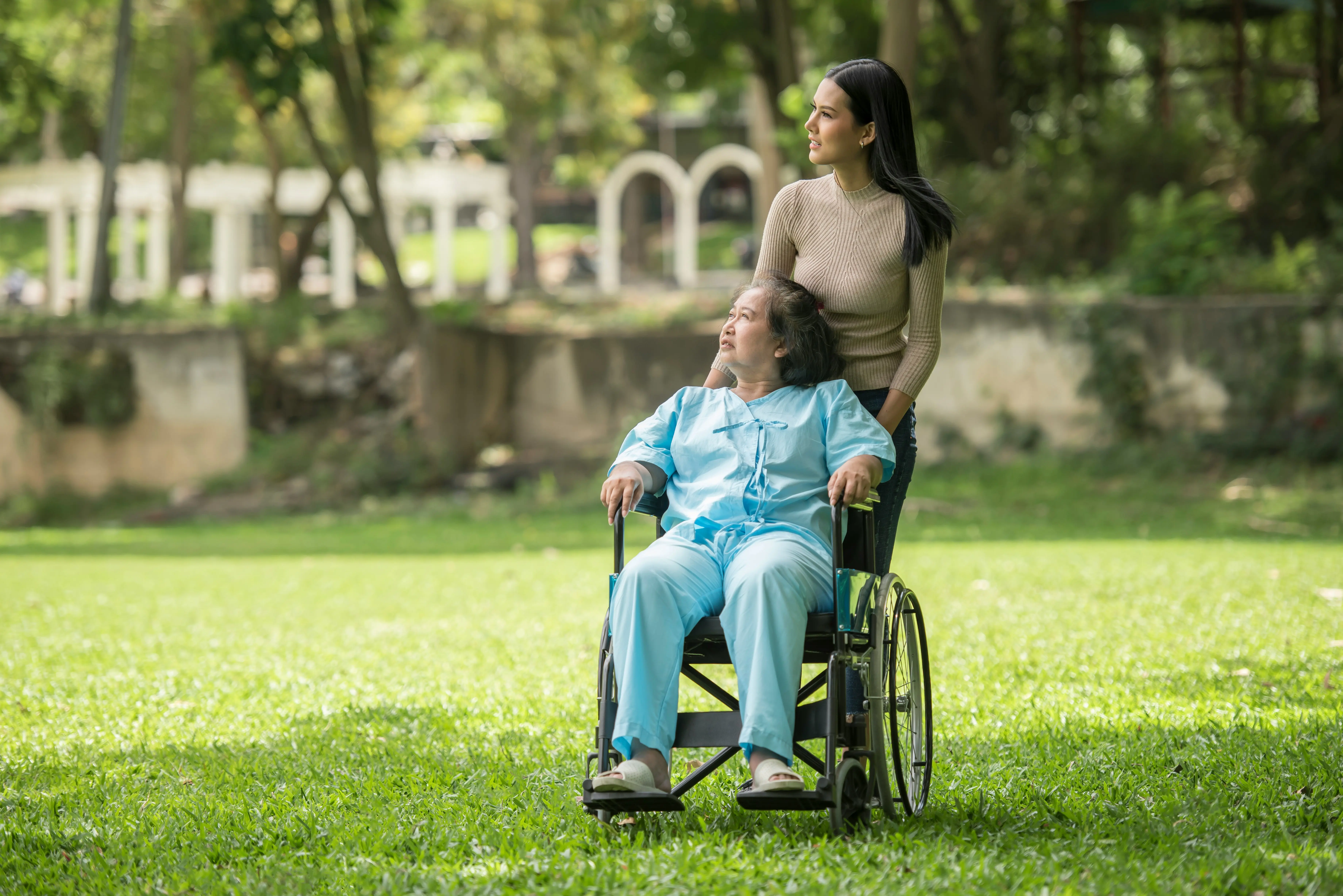 Caregiver and senior in park